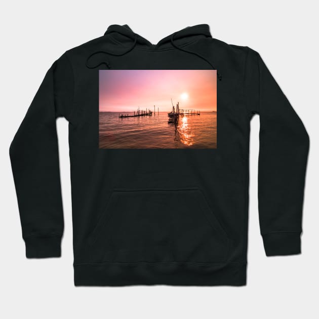 Old dock sunrise Hoodie by homydesign